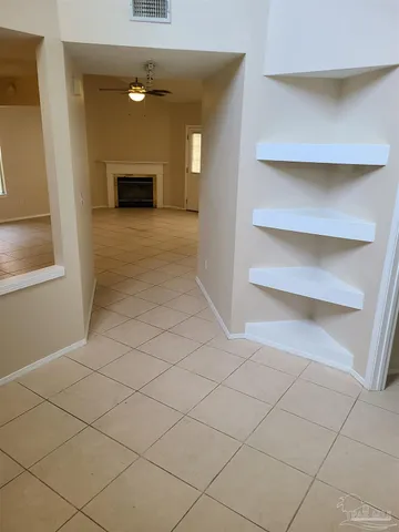 a view of a hallway with closet
