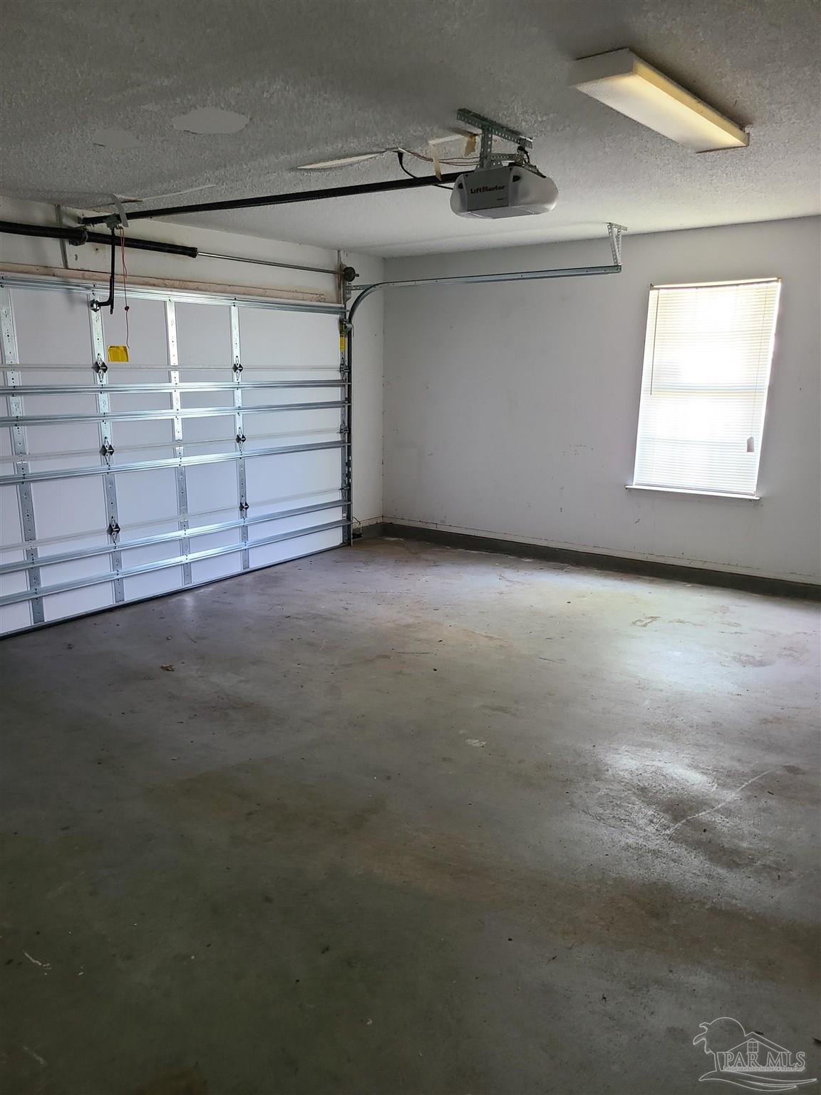 137 Mirabelle Circle Pensacola, FL 32514 - Photo 18 of 21 a view of a garage