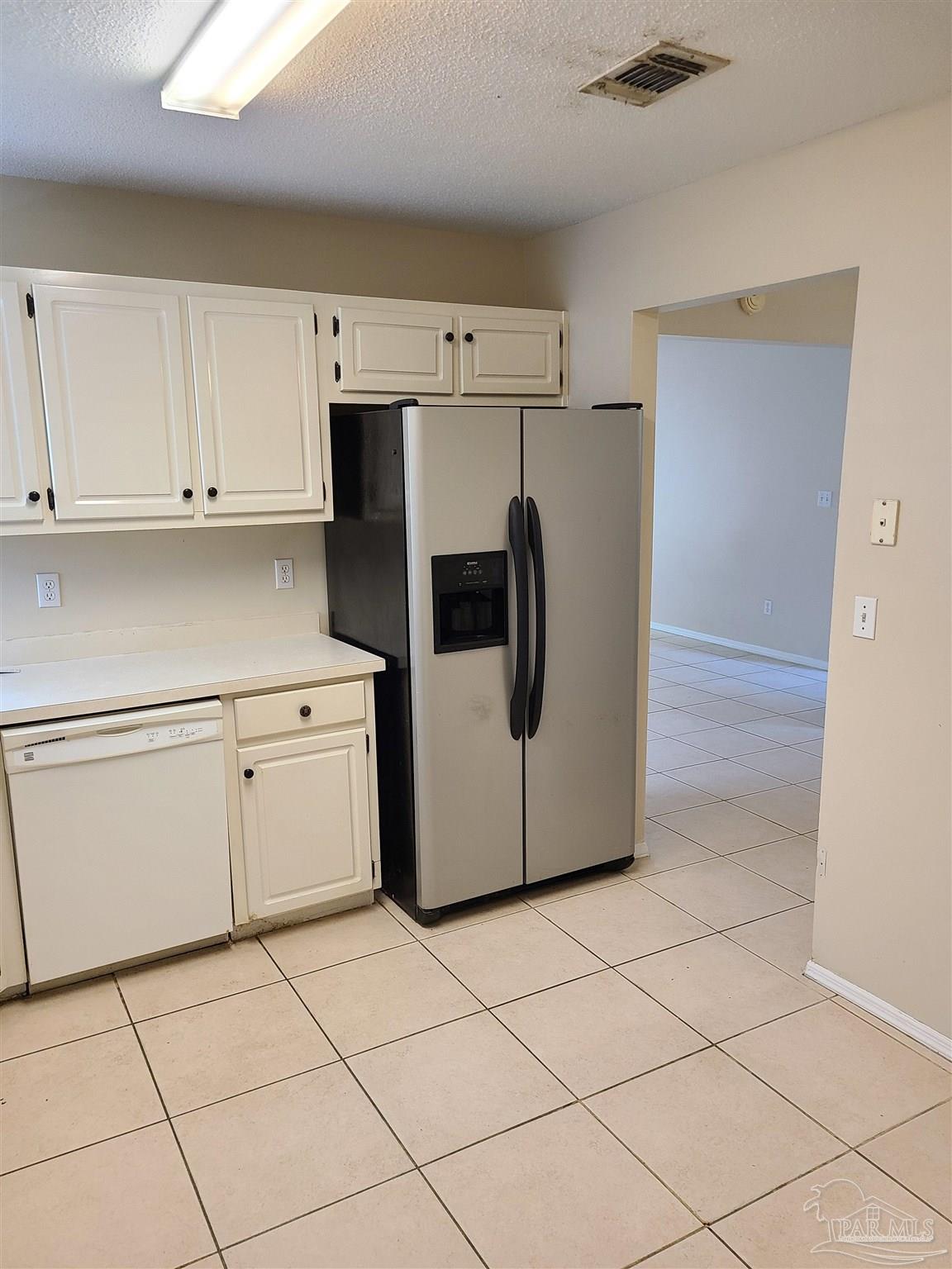 137 Mirabelle Circle Pensacola, FL 32514 - Photo 5 of 21 a utility room with cabinets washer and dryer