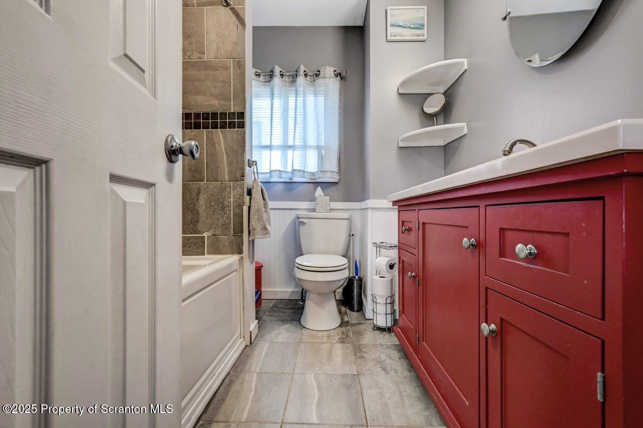 3618 Winfield Avenue Moosic, PA 18507 - Photo 24 of 54 a bathroom with a toilet a sink and a shower