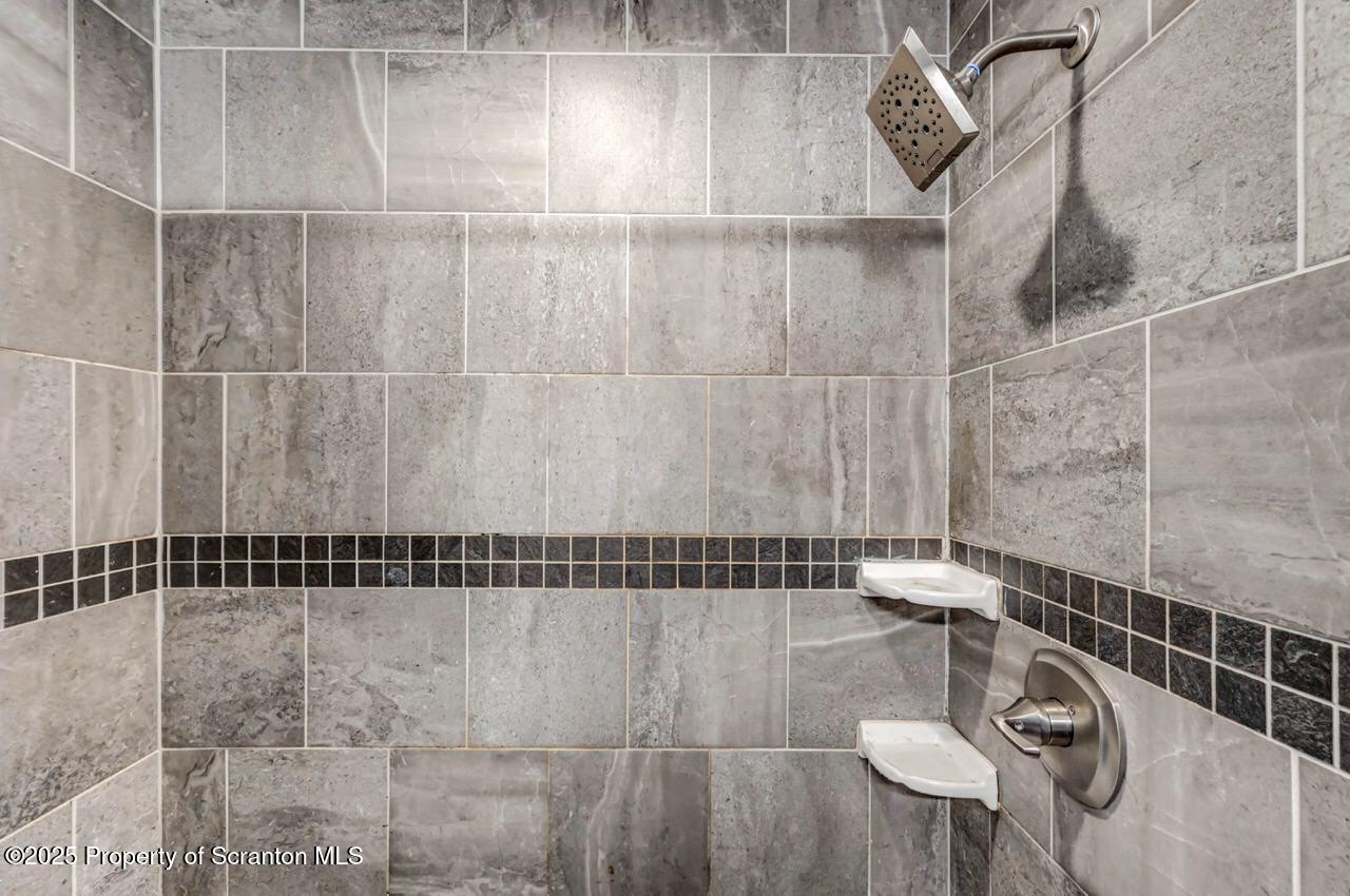 3618 Winfield Avenue Moosic, PA 18507 - Photo 26 of 54 a bathroom with a shower