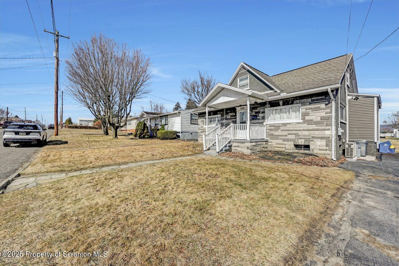 3618 Winfield Avenue Moosic, PA 18507 - Photo 53 of 54 a front view of a house with a yard