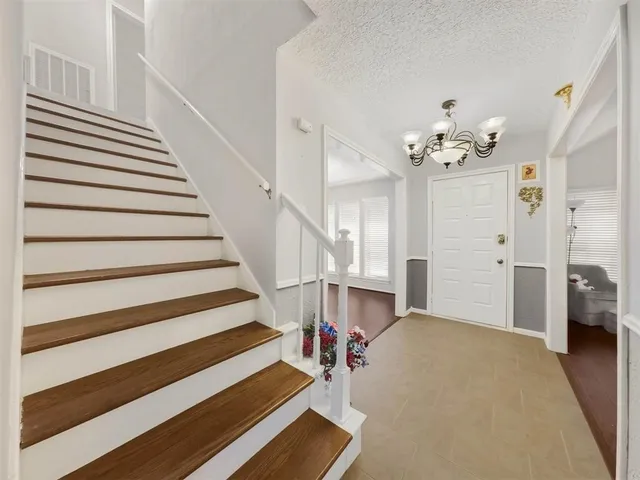 a view of a livingroom with a staircase