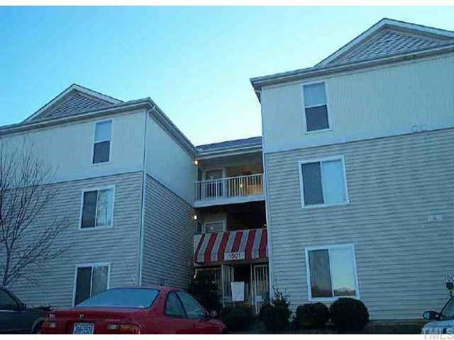 1501 Graduate, Unit 203 Raleigh, NC 27606 - Photo 1 of 1 a front view of a house with parking space