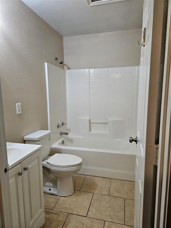 225 East Craven Avenue Lacy-Lakeview, TX 76705 - Photo 5 of 11 a bathroom with a sink a toilet and shower