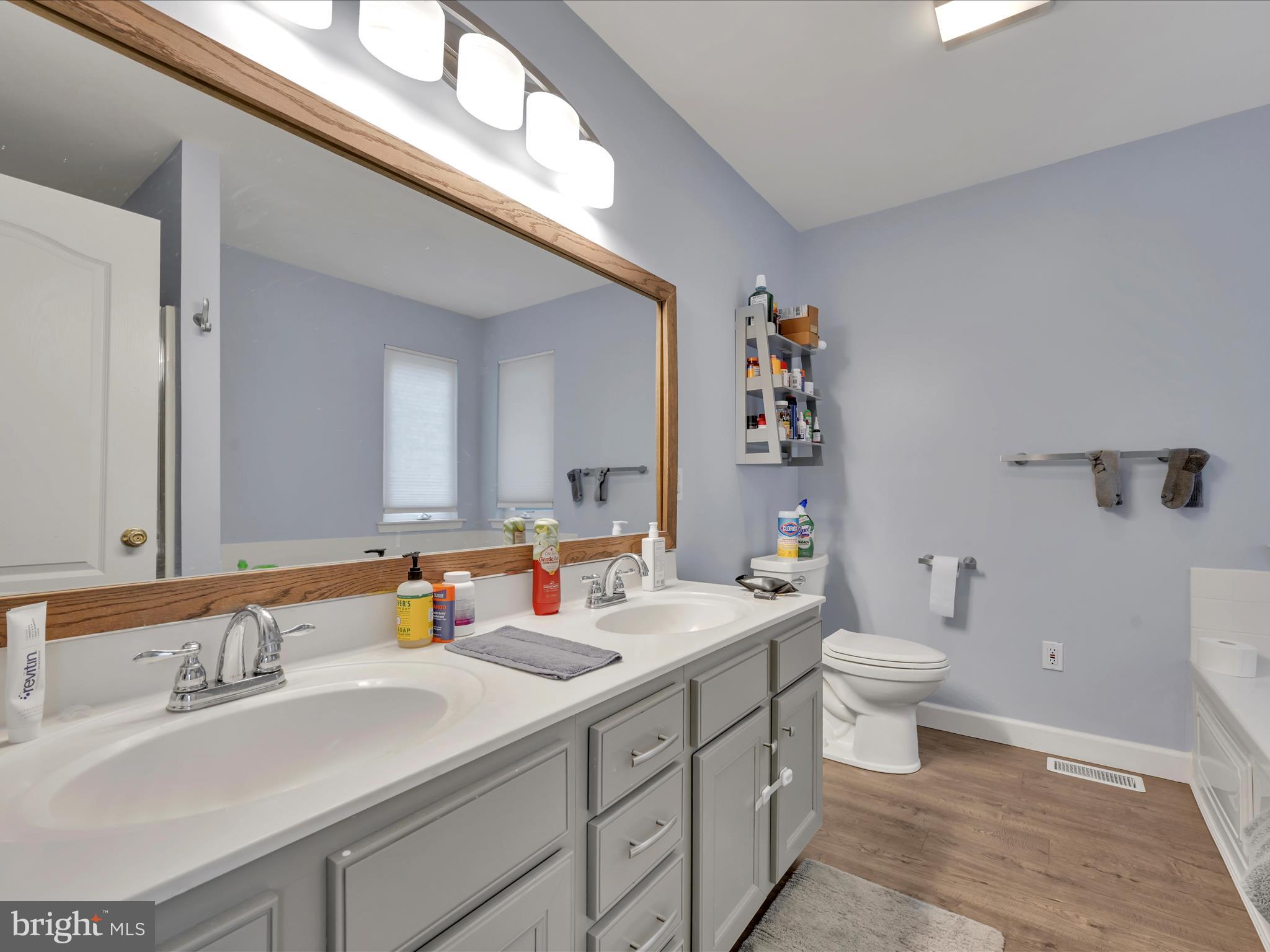 15 Country Club Road Ashland, PA 17921 - Photo 24 of 39 a bathroom with a double vanity sink mirror and toilet