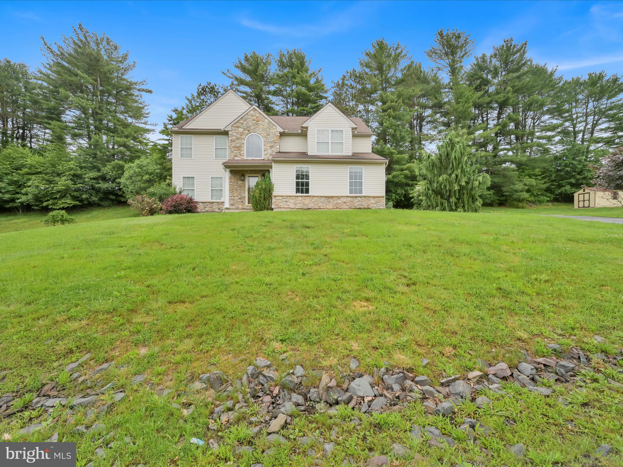 15 Country Club Road Ashland, PA 17921 - Photo 4 of 39 a front view of a house with a garden