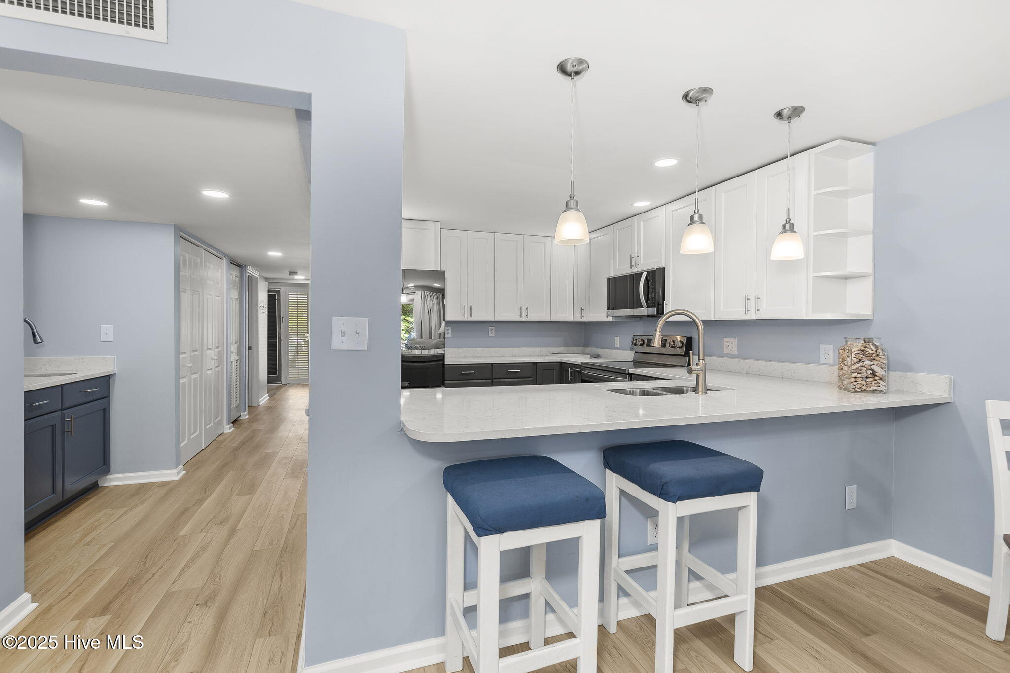 331 Salter Path Road, Unit 104 BEACHWALK Pine Knoll Shores, NC 28512 - Photo 13 of 47 Updated kitchen w/ bar seating