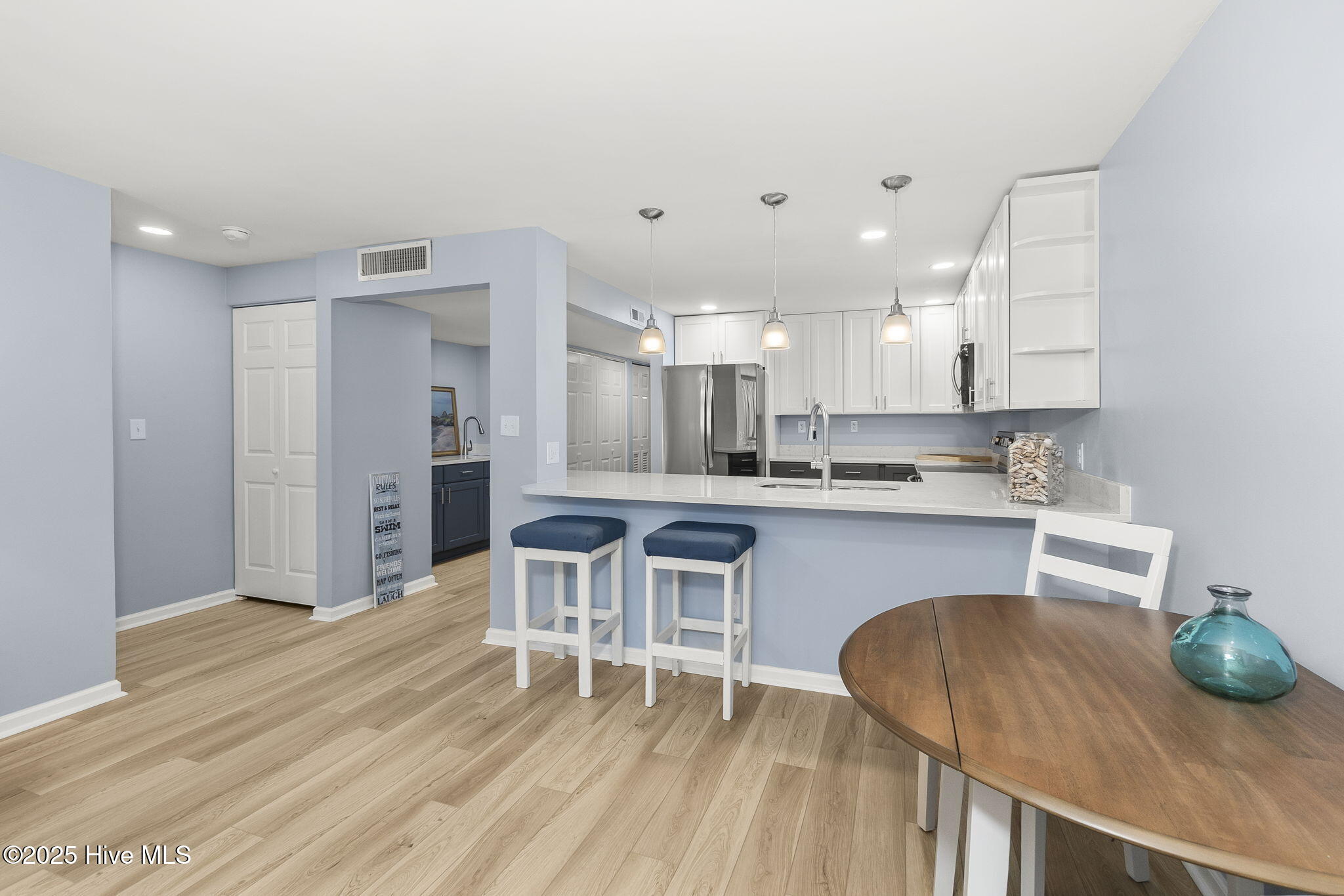 331 Salter Path Road, Unit 104 BEACHWALK Pine Knoll Shores, NC 28512 - Photo 15 of 47 Updated kitchen w/ bar seating