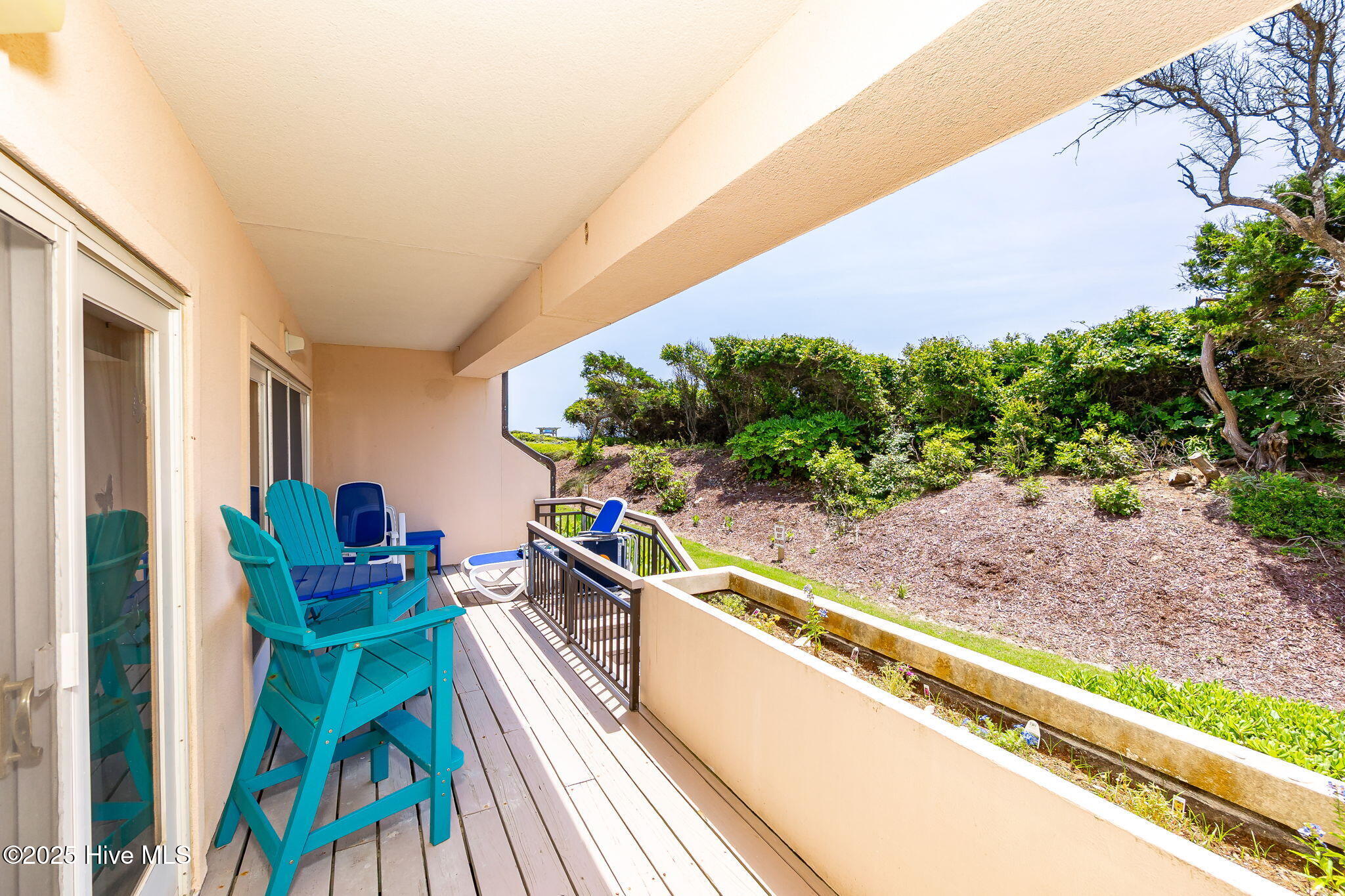 331 Salter Path Road, Unit 104 BEACHWALK Pine Knoll Shores, NC 28512 - Photo 9 of 47 Covered deck w/ ocean views