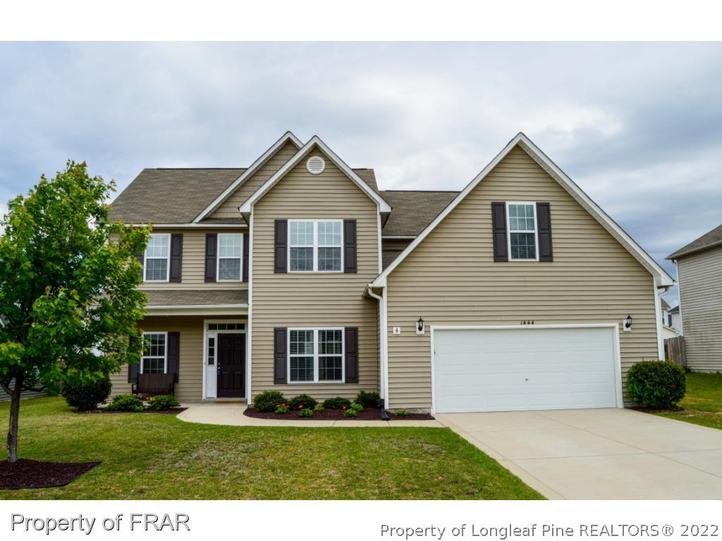1444 Rough Rider Lane Parkton, NC 28371 - Photo 1 of 36 a front view of house with yard and green space