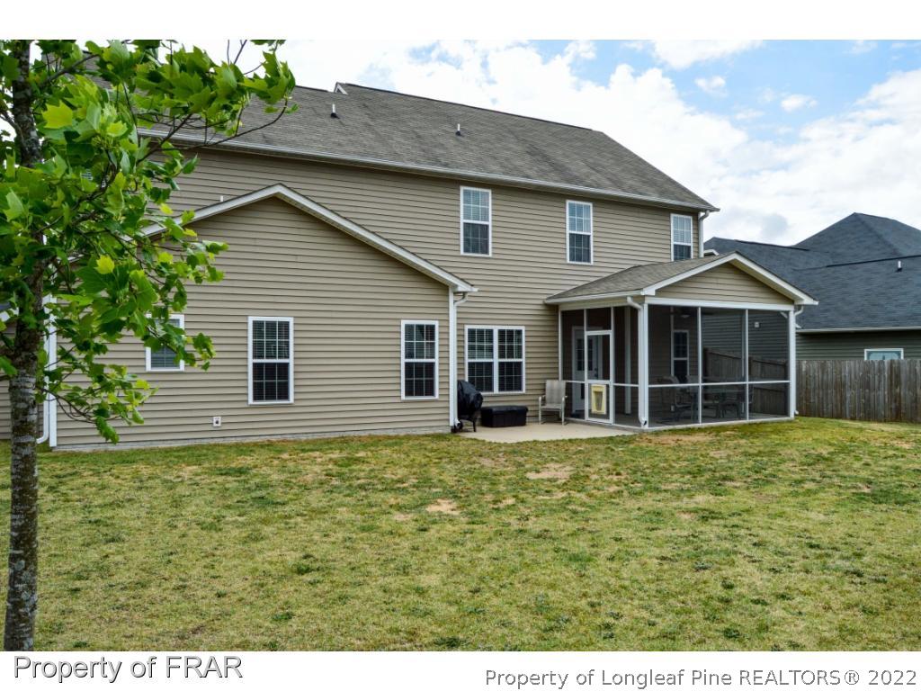 1444 Rough Rider Lane Parkton, NC 28371 - Photo 36 of 36 a house view with a garden space