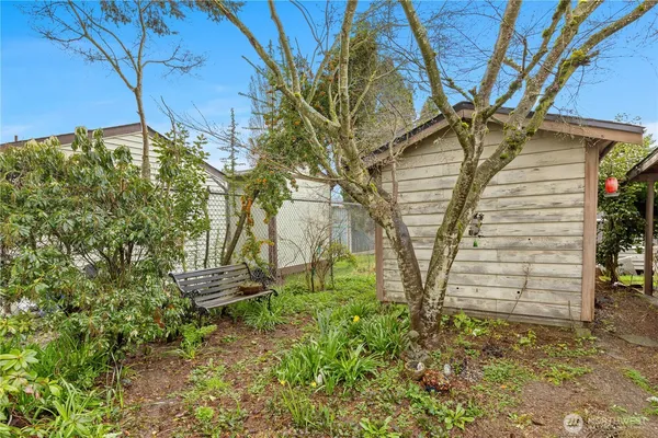 a backyard of a house with lots of green space