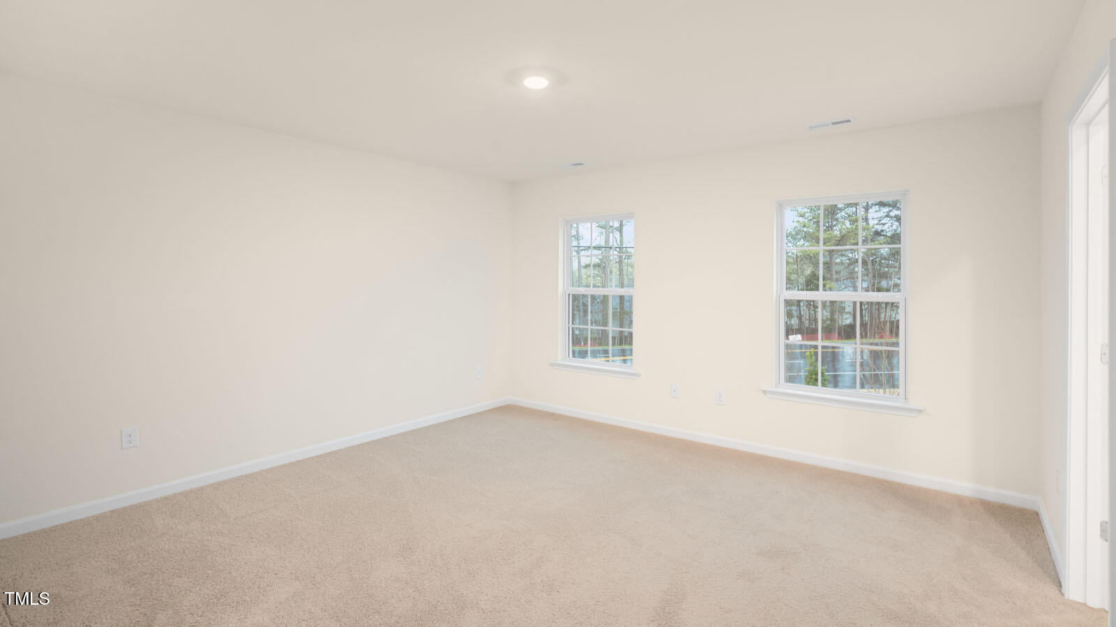 3604 Sorda Court Raleigh, NC 27610 - Photo 18 of 25 an empty room with a window