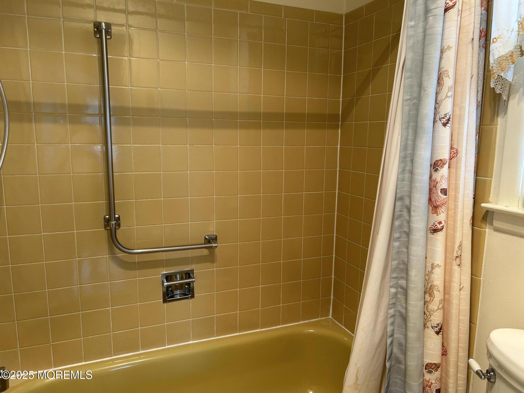 5 Lamb Road Brick, NJ 08724 - Photo 17 of 38 a bathroom with a shower
