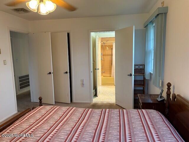 5 Lamb Road Brick, NJ 08724 - Photo 18 of 38 a bedroom with a bed and a chandelier