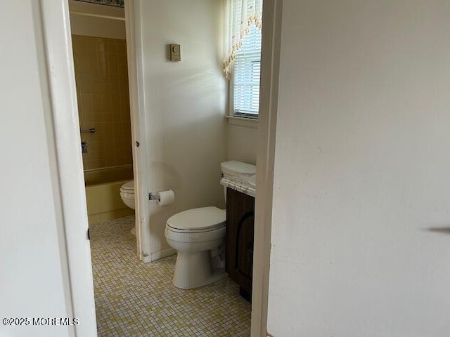 5 Lamb Road Brick, NJ 08724 - Photo 20 of 38 a white toilet sitting next to a bathroom sink and vanity