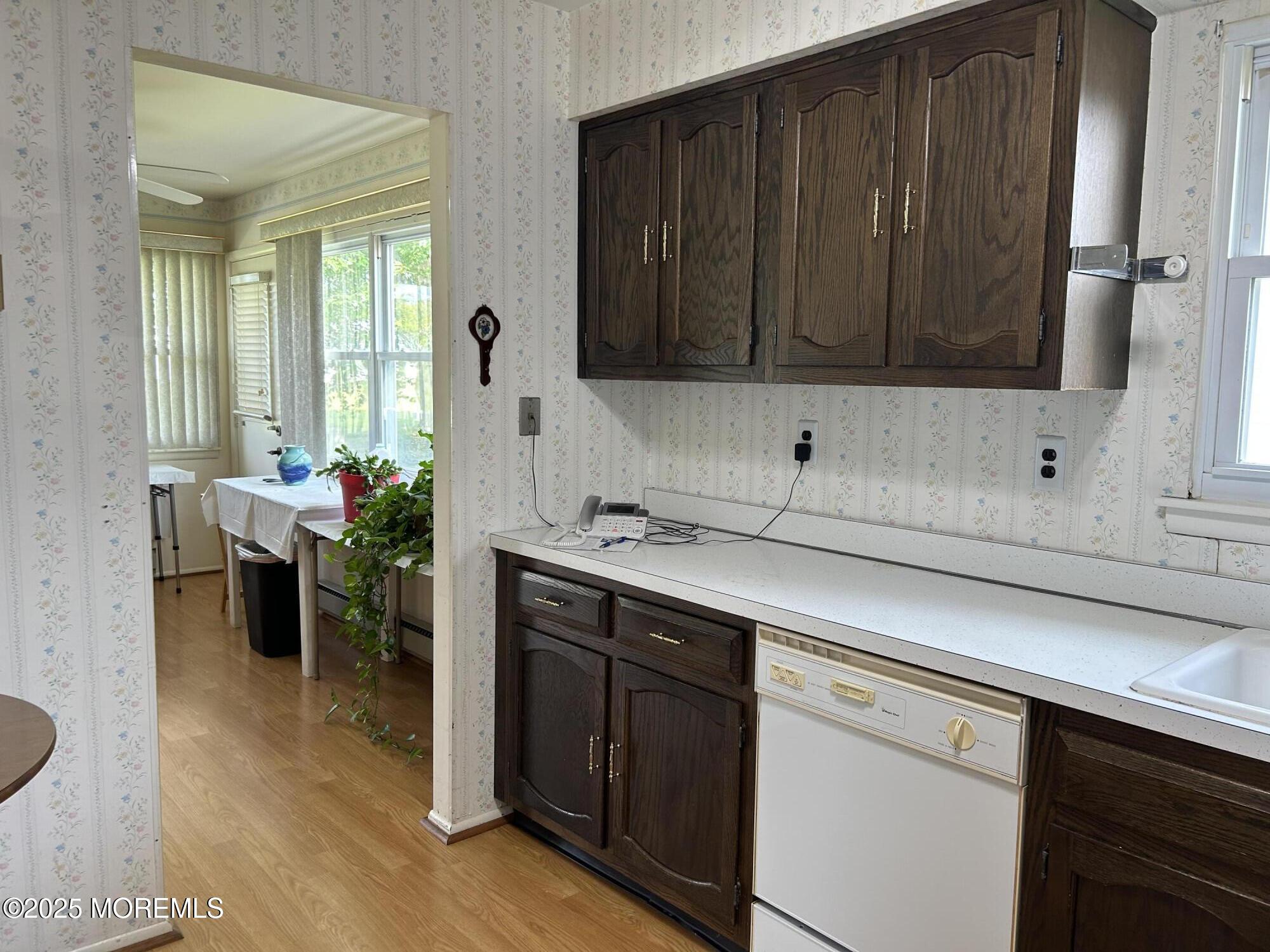 5 Lamb Road Brick, NJ 08724 - Photo 2 of 38 a kitchen with a sink cabinets and wooden floor