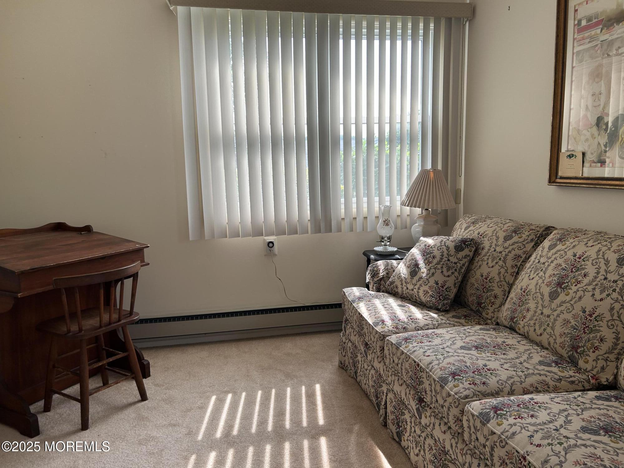 5 Lamb Road Brick, NJ 08724 - Photo 22 of 38 a living room with furniture and a window