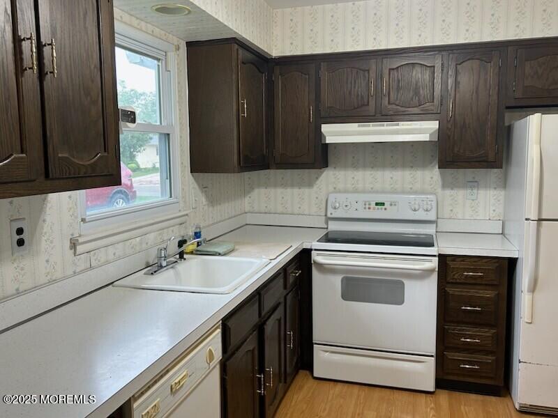 5 Lamb Road Brick, NJ 08724 - Photo 7 of 38 a kitchen with a sink cabinets and appliances