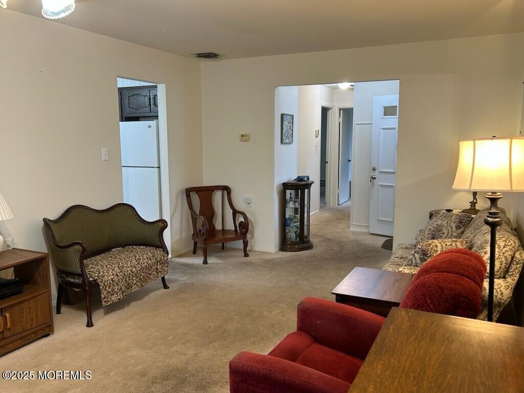5 Lamb Road Brick, NJ 08724 - Photo 9 of 38 a living room with furniture and a lamp