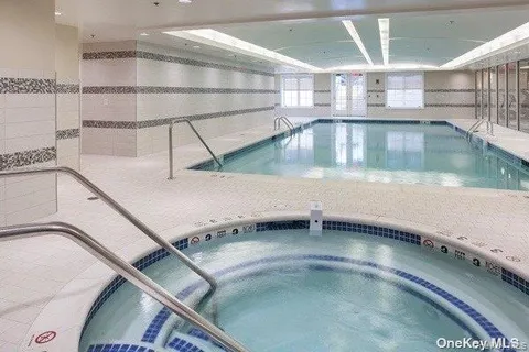 a view of a swimming pool and window