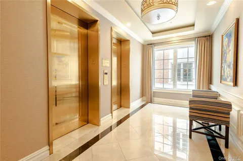 a view of a bathroom with a tub and shower