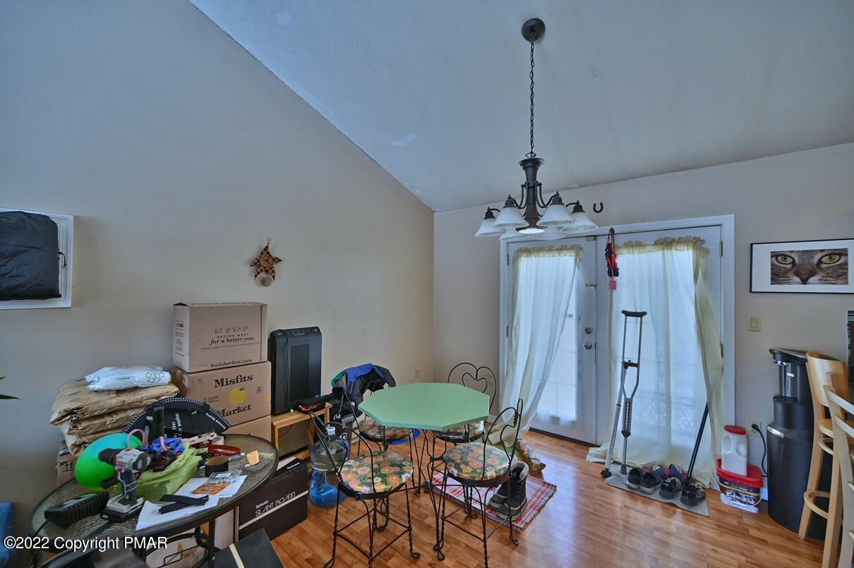 1039 Dancing Ridge Road East Stroudsburg, PA 18302 - Photo 10 of 40 a workspace with furniture and wooden floor
