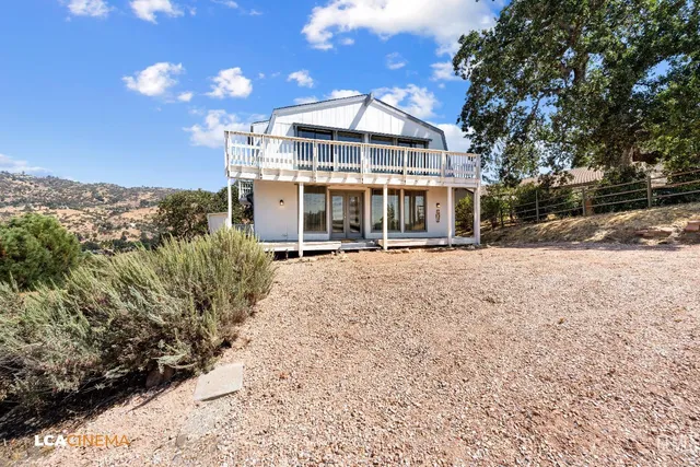 a view of a building with a yard