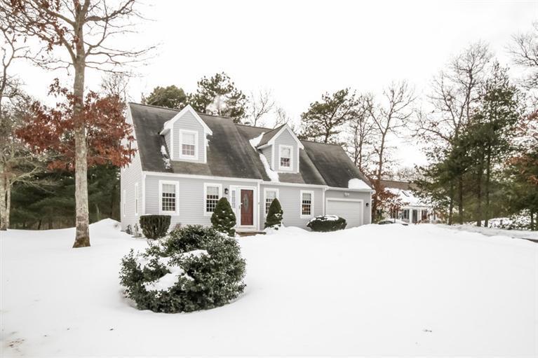 7 Whitecliff Road Buzzards Bay, MA 02532 - Photo 2 of 21 a view of a white house with a snow in the background
