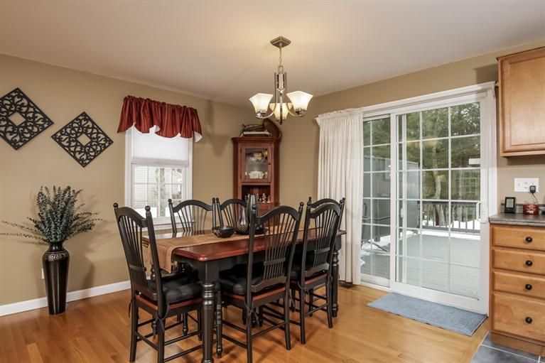 7 Whitecliff Road Buzzards Bay, MA 02532 - Photo 5 of 21 a view of a dining room with furniture window and wooden floor