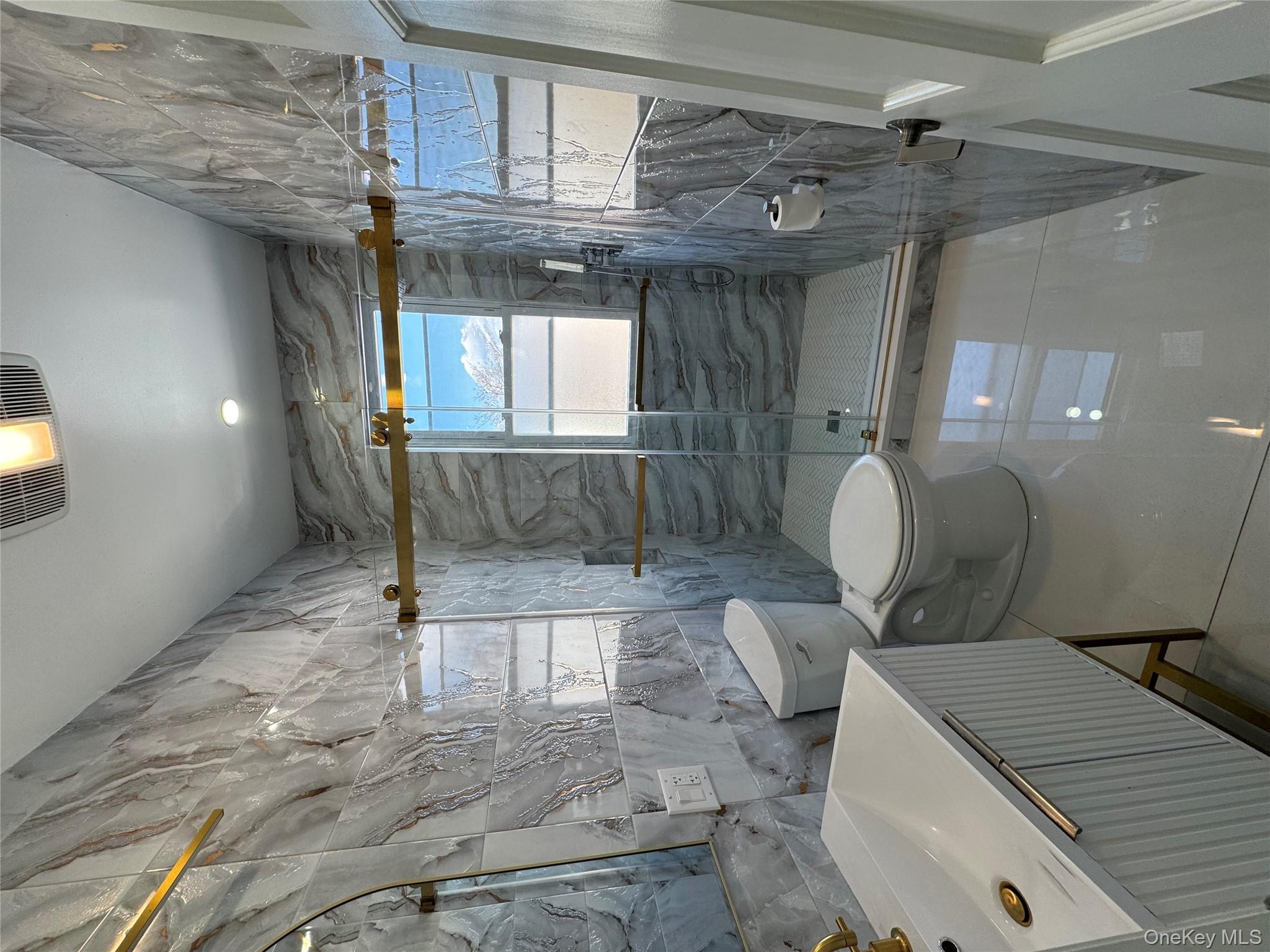 88-36 77th Street Queens, NY 11421 - Photo 4 of 19 a bathroom with a sink toilet and shower