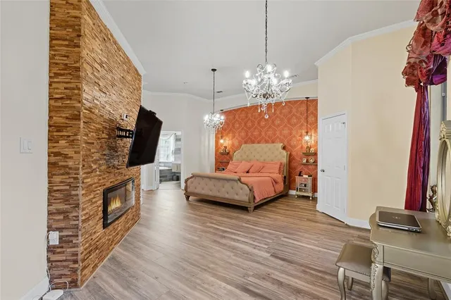 a living room with furniture fireplace and flat screen tv