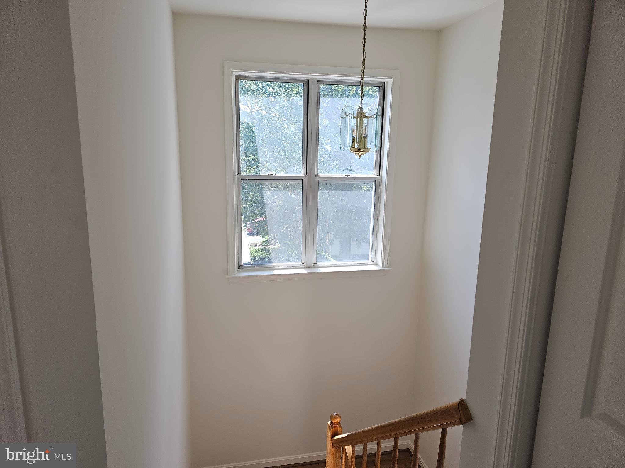 6306 Over See Court Springfield, VA 22152 - Photo 17 of 30 a view of a hallway with windows