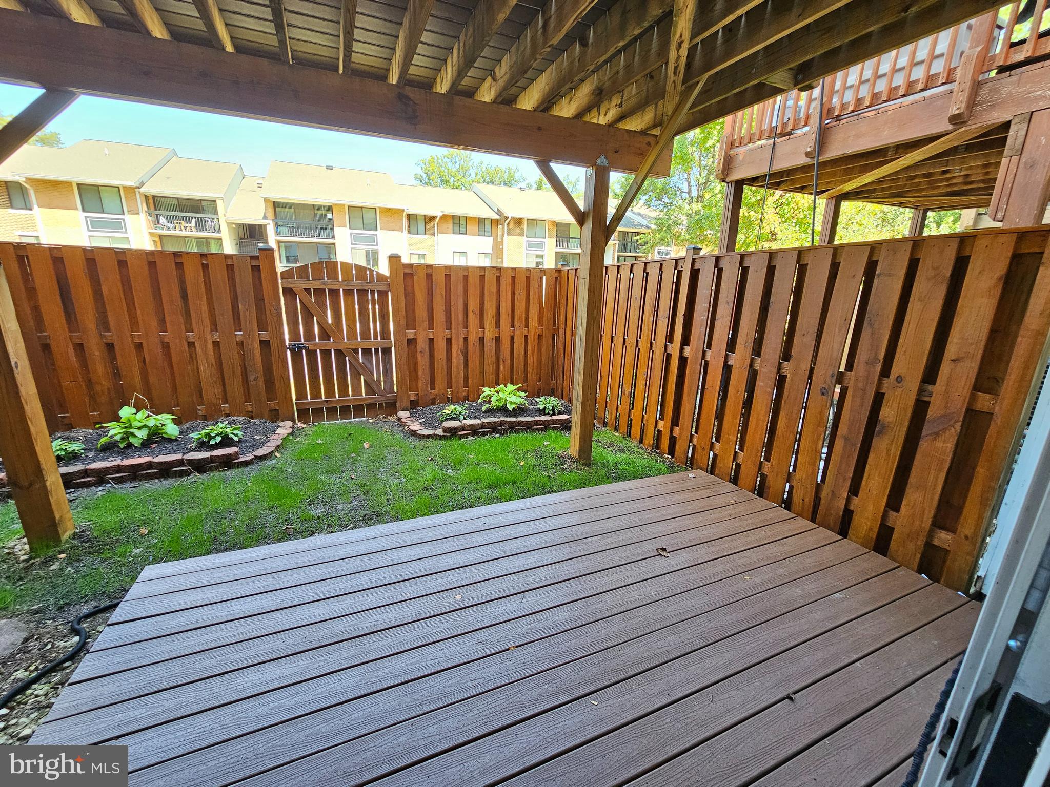 6306 Over See Court Springfield, VA 22152 - Photo 22 of 30 a view of a backyard with wooden fence