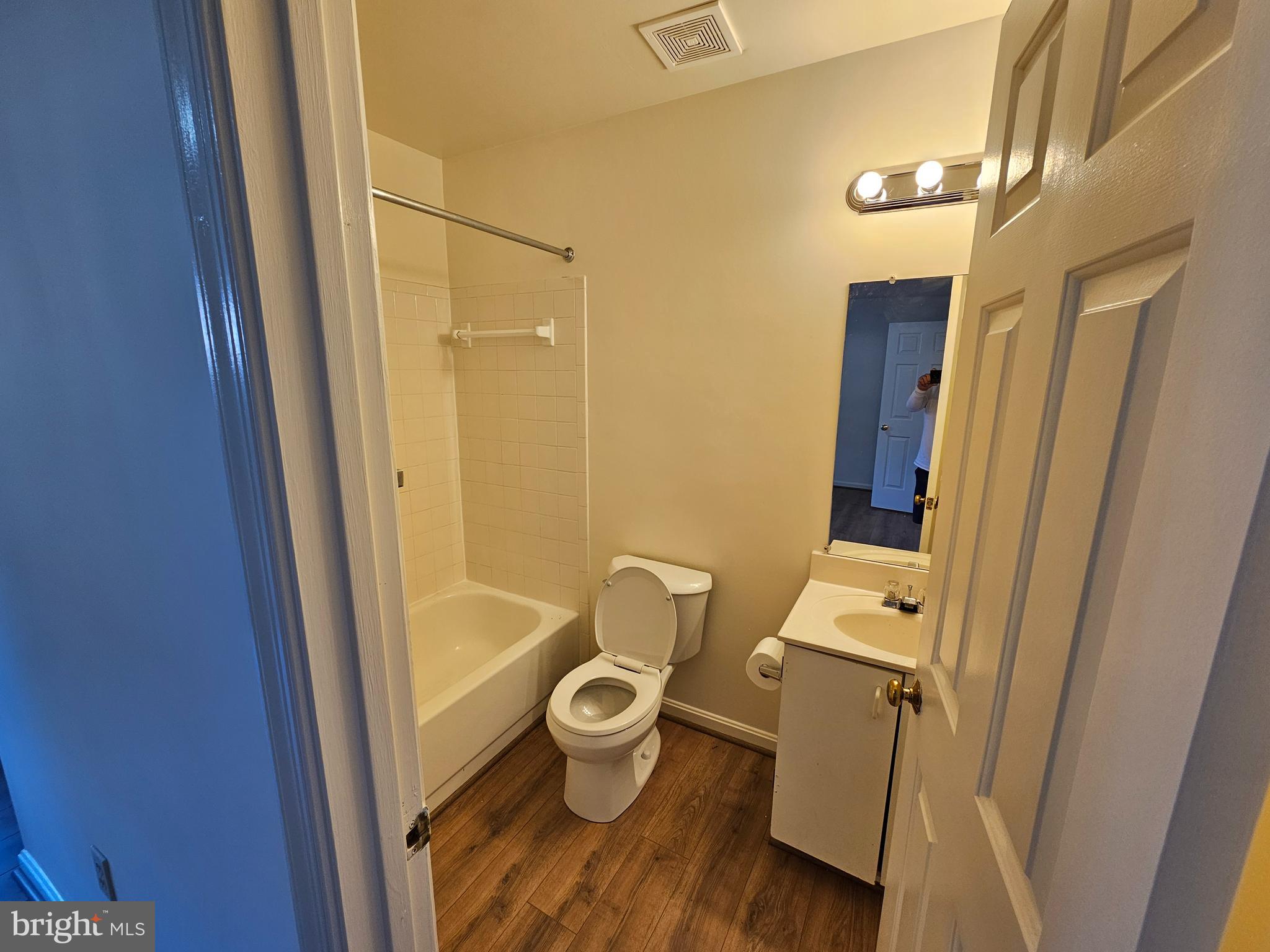 6306 Over See Court Springfield, VA 22152 - Photo 25 of 30 a bathroom with a tub and a shower