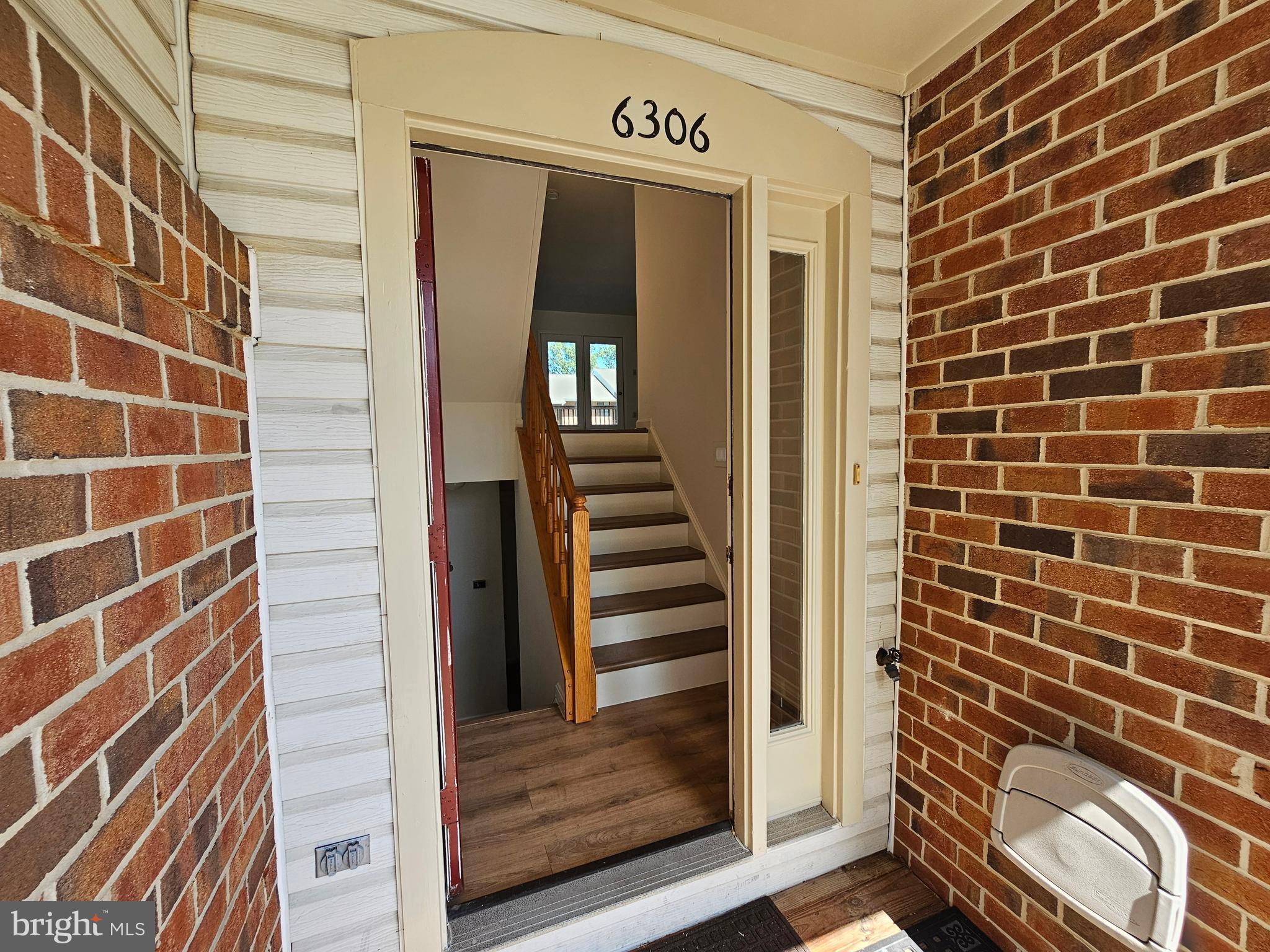 6306 Over See Court Springfield, VA 22152 - Photo 29 of 30 a view of a wooden door and a shower