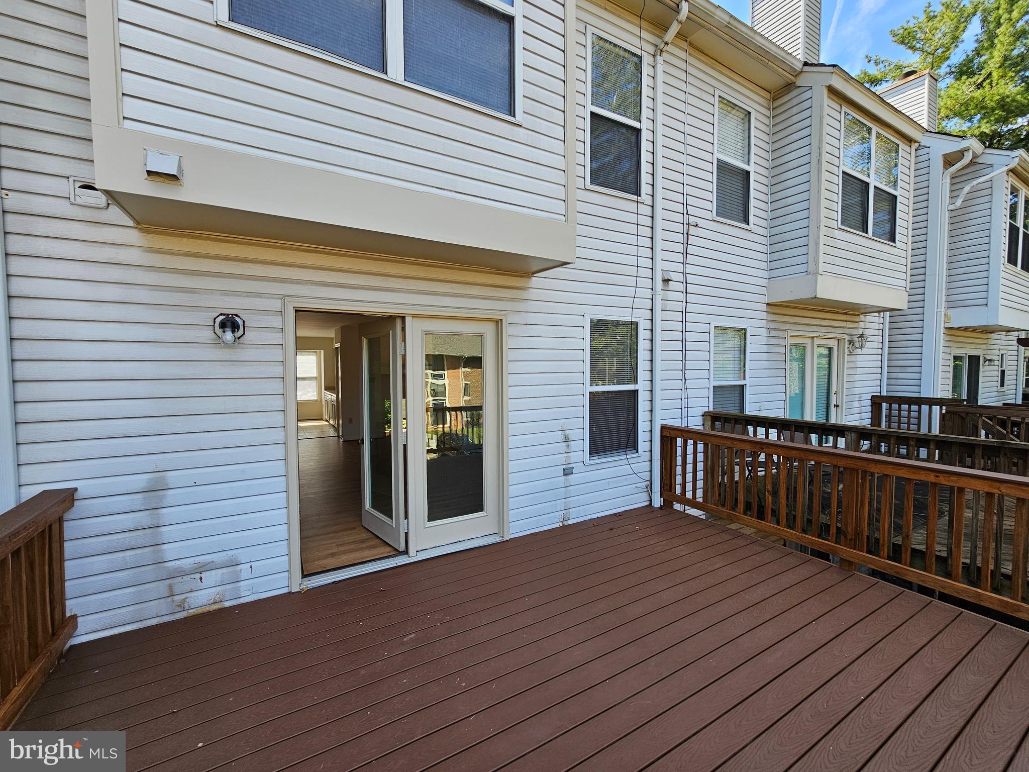 6306 Over See Court Springfield, VA 22152 - Photo 4 of 30 a view of a house with wooden deck