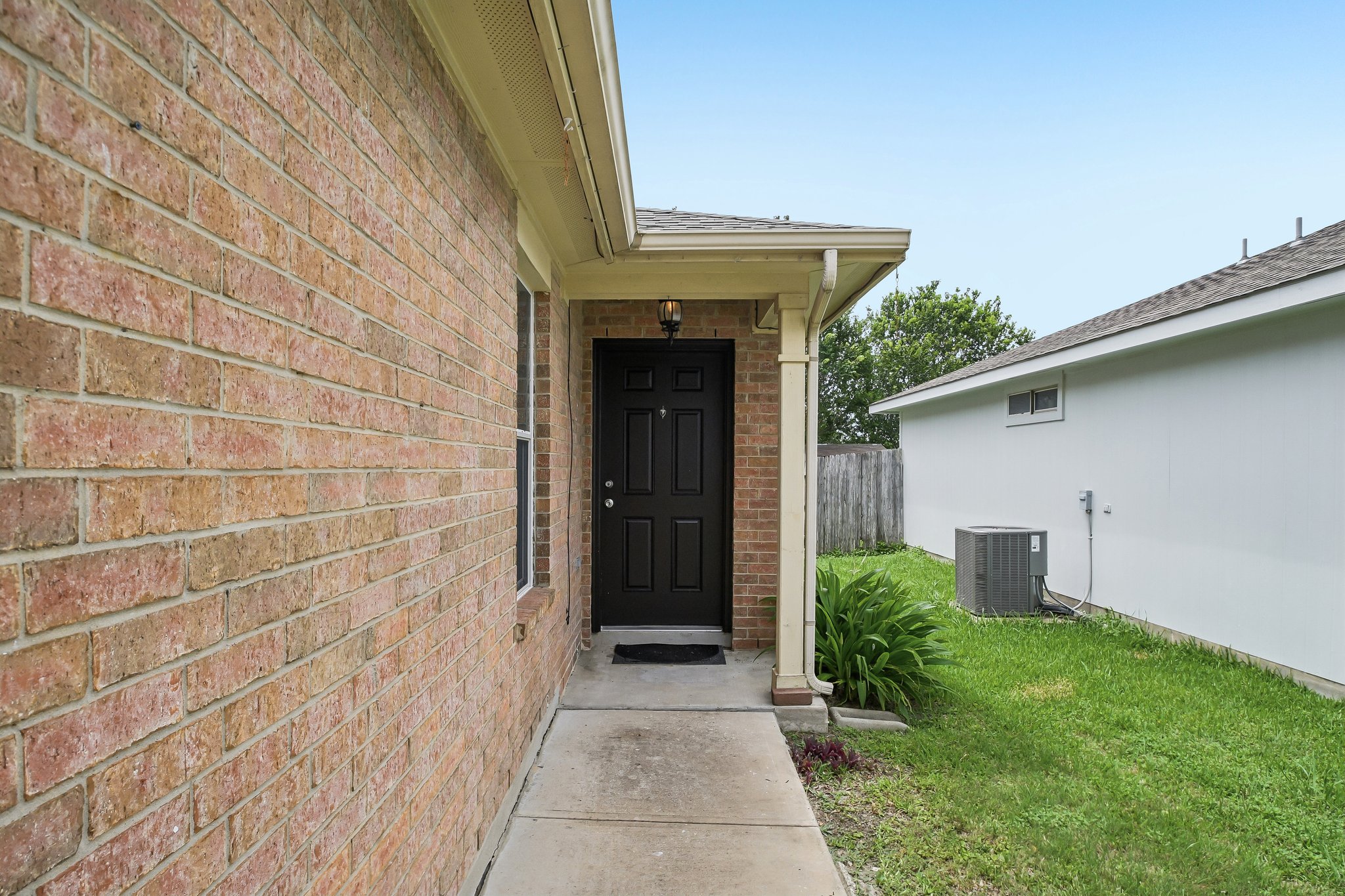 610 Lavaca Loop Elgin, TX 78621 - Photo 4 of 37 Newly painted front door