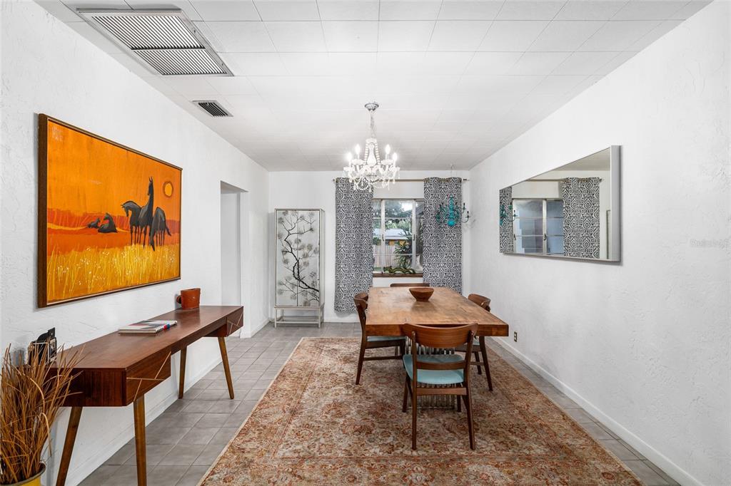 2027 Pinecrest Way Clearwater, FL 33755 - Photo 13 of 47 a room with furniture and window