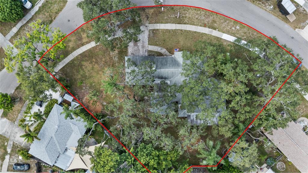 2027 Pinecrest Way Clearwater, FL 33755 - Photo 2 of 47 an aerial view of a house