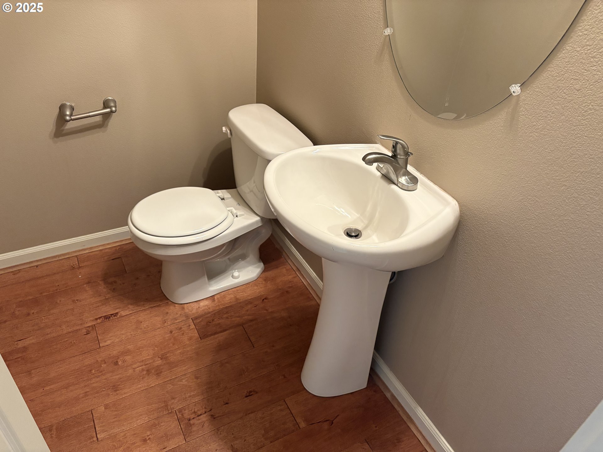 10552 Northeast Gateway Street Hillsboro, OR 97006 - Photo 12 of 41 a bathroom with a sink toilet and a mirror
