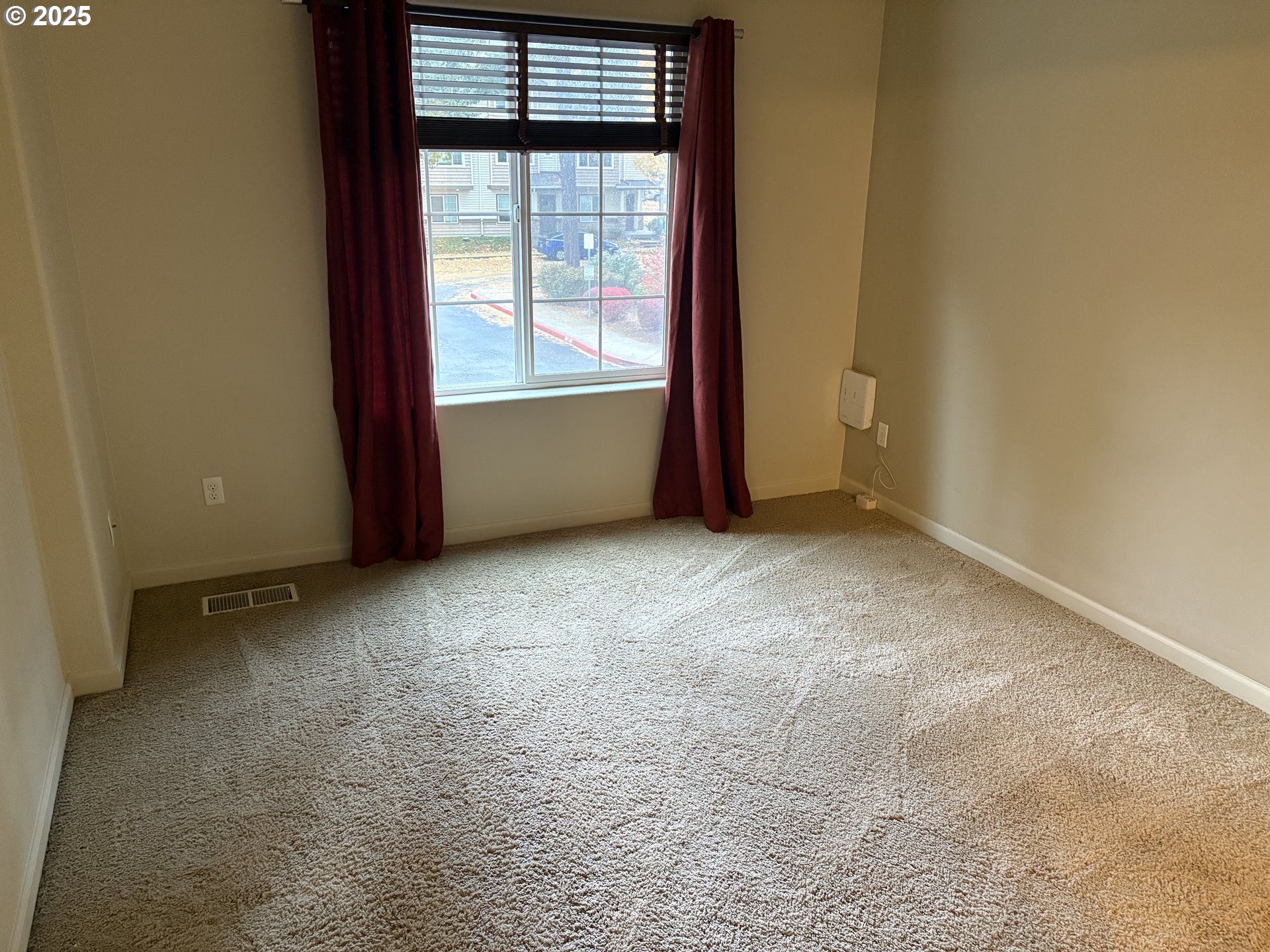 10552 Northeast Gateway Street Hillsboro, OR 97006 - Photo 14 of 41 a view of an empty room with a window