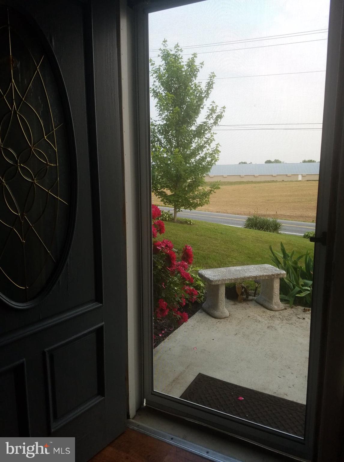 1584 Hossler Road Manheim, PA 17545 - Photo 3 of 39 Front door/patio with bench