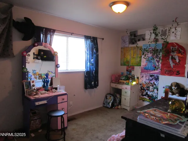 a room with furniture and a window