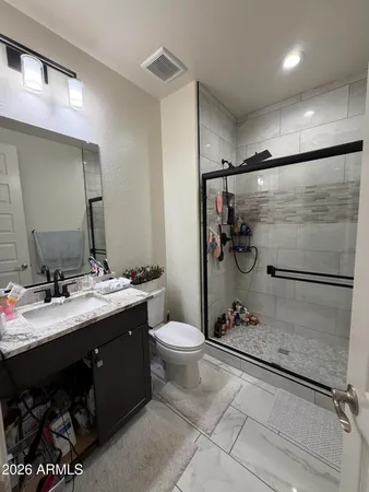 view of bathroom with a shower and a tub