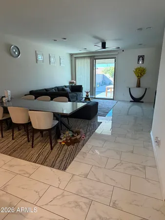 a living room with furniture and a window