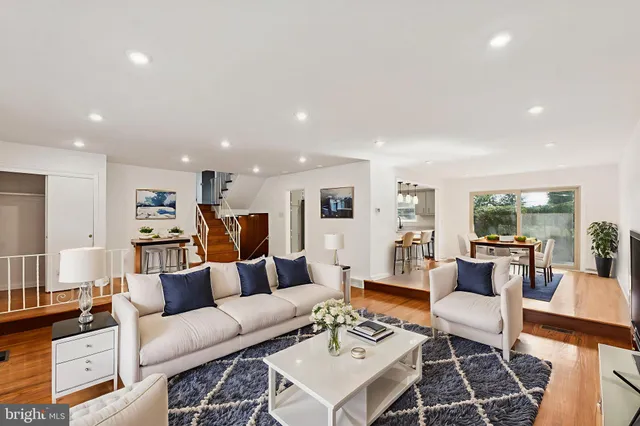 a living room with furniture and a couch