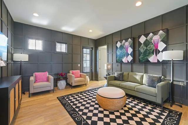 a living room with furniture and a couch