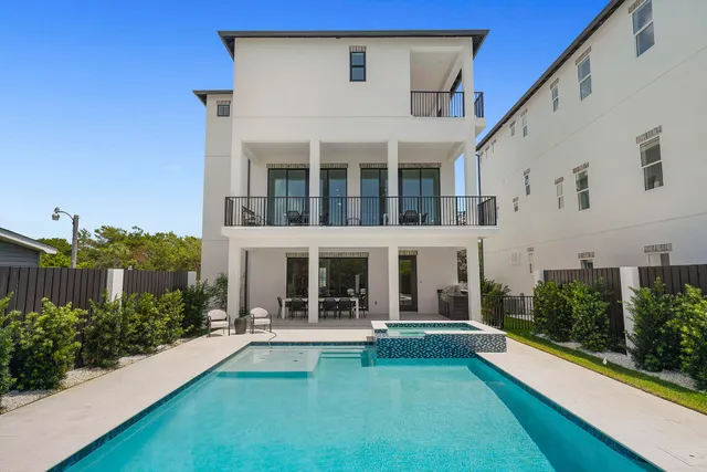 a view of house with yard in front of it